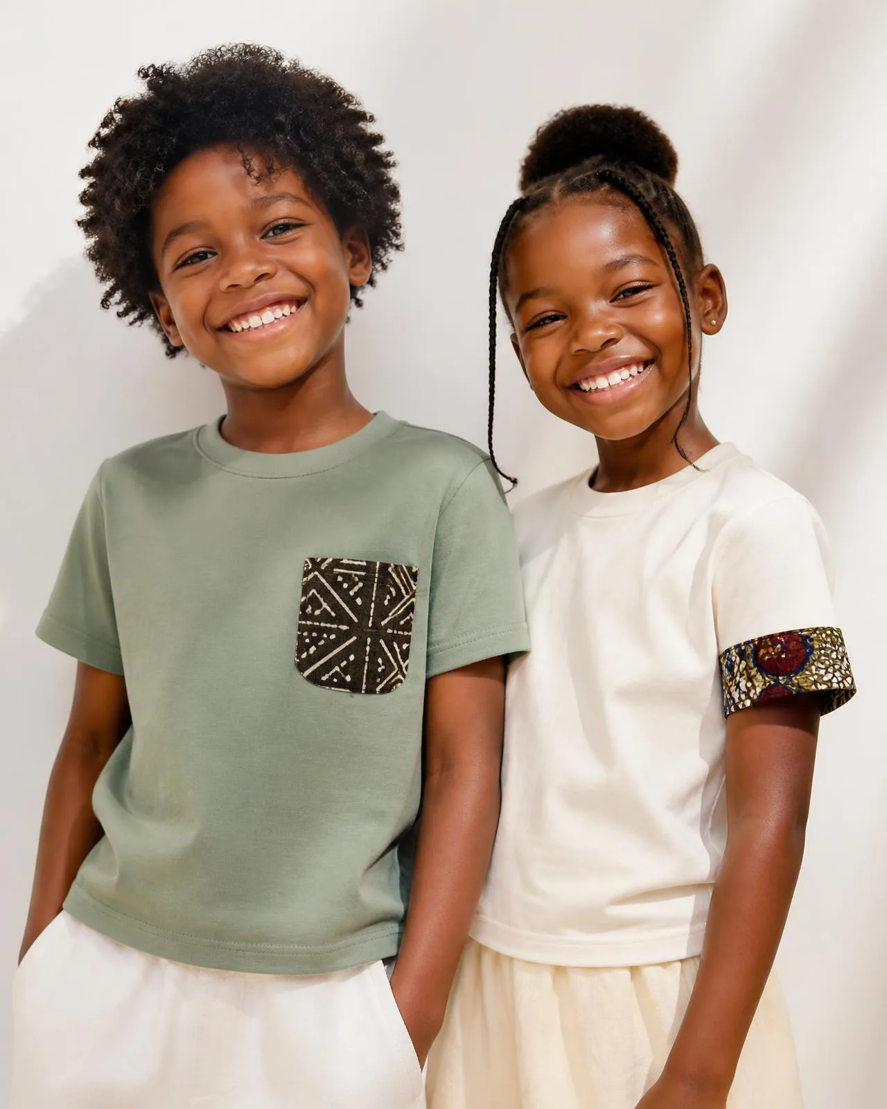 Z-Tee Enfant™ — Built for the playground, cut like the house., finished with the house African heritage cloth signature